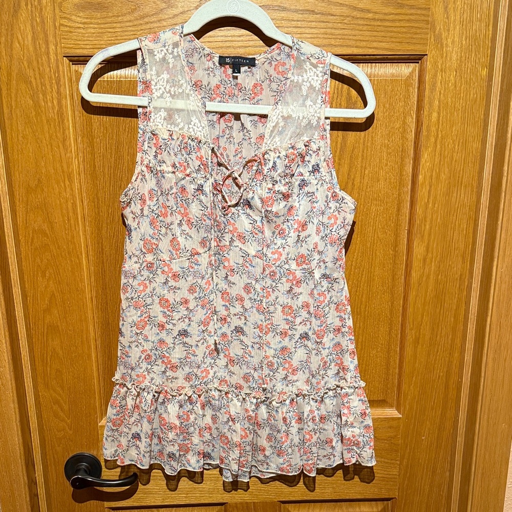 Floral Sleeveless Blouse with Lace Accents